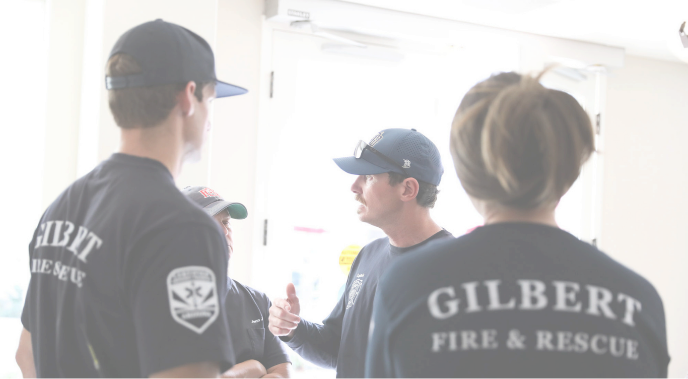 Gilbert Fire & Rescue staff standing together wearing Gilbert Fire & Rescue shirts